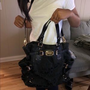 Black Michael’s Kors purse